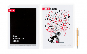 taz-Block mit taz-Holzkugelschreiber